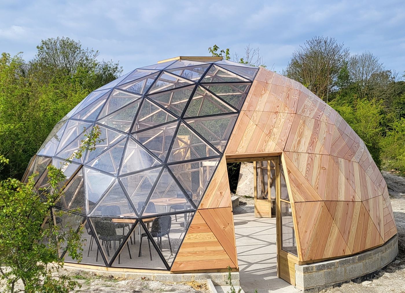 The completed dome on its concrete ring beam, scrub and chalk behind